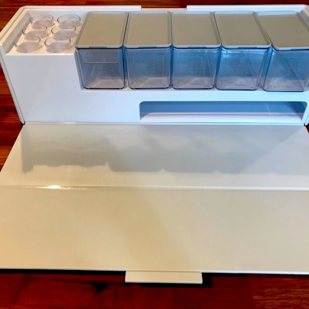 Prep kit with cutting board, plastic containers, and removable trash bin